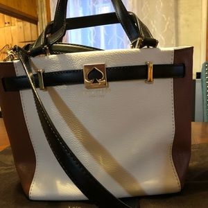 Kate Spade- Crossbody purse with classic looks.